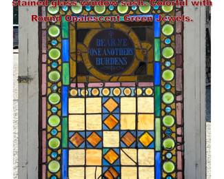 Lot 1830 Antique American leaded and stained glass window sash. Colorful with Round Opalescent Green Jewels.