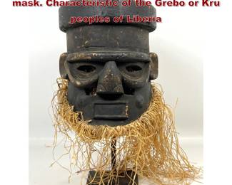Lot 2243 Large handcarved wooden helmet mask. Characteristic of the Grebo or Kru peoples of Liberia