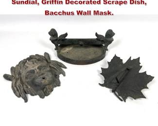 Lot 1954 2pcs Antique Metalware. Leaf Sundial, Griffin Decorated Scrape Dish, Bacchus Wall Mask.