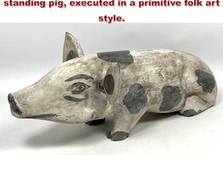 Lot 2225 Handcarved wooden figurine of a standing pig, executed in a primitive folk art style.