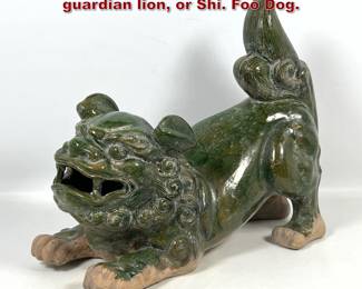Lot 1873 Chinese glazed pottery figure of a guardian lion, or Shi. Foo Dog.