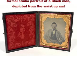 Lot 2220 Sixthplate tintype features a formal studio portrait of a Black man, depicted from the waist up and