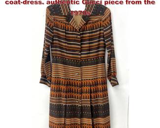 Lot 2271 Vintage longsleeved buttonfront coatdress. authentic Gucci piece from the 1970s