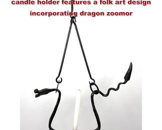 Lot 1814 F BAU Handwrought iron hanging candle holder features a folk art design incorporating dragon zoomor