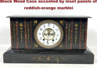 Lot 1975 Antique Seth Thomas mantel clock. Black Wood Case accented by inset panels of reddishorange marblei