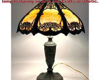 Lot 1807 Early 20th century slag glass table lamp featuring an Arts and Crafts aesthetic.