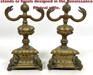 Lot 2205 Pair of cast brass decorative stands or finials designed in the Renaissance Revival style.