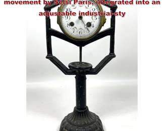 Lot 1976 Antique desk clock featuring a movement by Selsi Paris, integrated into an adjustable industrialsty