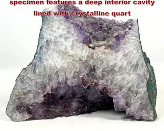 Lot 2226 Large Amethyst cathedral geode specimen features a deep interior cavity lined with crystalline quart