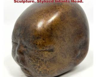 Lot 1930 Signed L. Bernhard Bronze Sculpture. Stylized Infants Head.