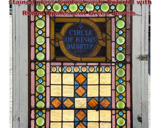 Lot 1832 Antique American leaded and stained glass window sash. Colorful with Round Opalescent Green Jewels.