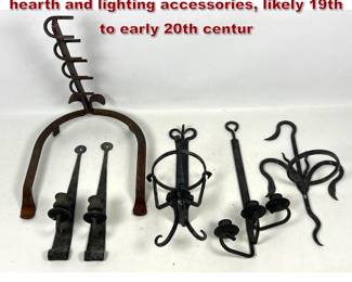 Lot 2329 Forged Iron Lot. handwrought iron hearth and lighting accessories, likely 19th to early 20th centur