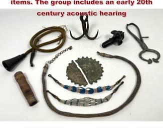Lot 2010 Eclectic collection of ethnographic items. The group includes an early 20th century acoustic hearing