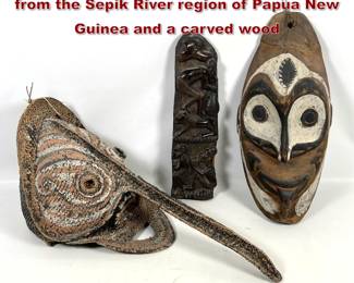 Lot 1996 3pcs ethnographic objects 2 masks from the Sepik River region of Papua New Guinea and a carved wood