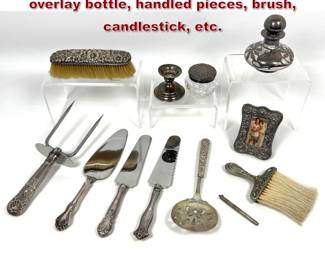 Lot 2120 12 pcs Mixed Sterling Lot. Sterling overlay bottle, handled pieces, brush, candlestick, etc.