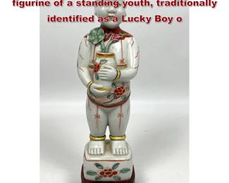 Lot 1864 Chinese polychrome porcelain figurine of a standing youth, traditionally identified as a Lucky Boy o