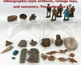 Lot 2327 Eclectic Lot. variety of ethnographicstyle artifacts, vintage toys, and souvenirs. The collection f