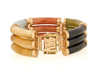 1065 A 14K Gold and Jade Bracelet Featuring a three-band design set with black, green, red, lavender and yellow jade Length: 7 1/2 in., Width: 7/8 in. 72.0 grams gross This lot is being offered with no reserve Estimate: $300 - $500