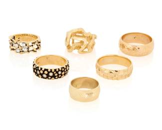 1085 A Group of Six 14K Gold Rings Featuring nugget and organic textures 6 pieces Sizes: 5 3/4 - 11 48.1 grams gross Estimate: $2,800 - $3,500