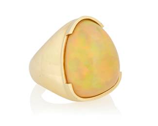 1096 A 14K Gold and Opal Ring Featuring an abstract opal cabochon measuring approximately 24.78 x 18.60 x 9.66 mm, set in a high polish design Size: 10 1/4 24.5 grams gross Estimate: $2,000 - $3,000