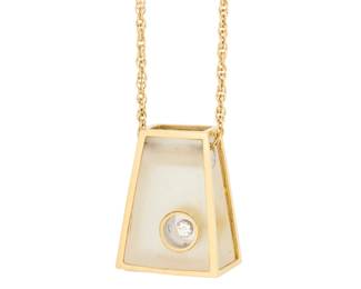 1117 A 14K Gold and Diamond Pendant Necklace Featuring a fancy link chain suspending a geometric resin pendant accented by a single round diamond Chain: 16 in., Pendant: 1 x 3/4 in. 11.3 grams gross This lot is being offered with no reserve Estimate: $400 - $600