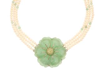 1074 A Sterling, Jade and Cultured Pearl Necklace Centering a carved jade floral element, set with round prasiolite, finished with three strands of cultured pearls accented by round jade beads measuring approximately 3.00 mm Length: 17 in., Jade Measures: 2 x 2 in. 58.9 grams gross Estimate: $400 - $600