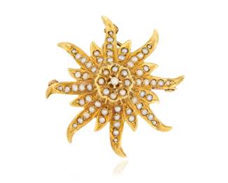 1023 A 14K Gold and Seed Pearl Pendant/Brooch Of a starburst design set with seed pearls, featuring an extendible bail, with maker's mark E Measures: 1 1/4 x 1 1/4 in. 5.25 grams gross Estimate: $500 - $700