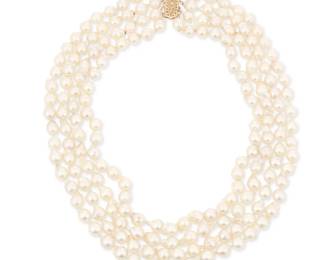1018 A 14K Gold and Cultured Pearl Necklace Featuring four nested strands of cultured pearls measuring approximately 8.00 - 8.50 mm, finished with a gold openwork clasp Length: 17 - 19 in. 148.0 grams gross Estimate: $600 - $800