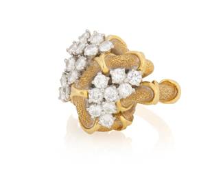 1086 A 14K Gold and Diamond Ring Featuring twenty-one round diamonds weighing approximately 2.10 carats, set in an organic bamboo design Size: 6 3/4 18.6 grams Estimate: $1,200 - $1,500