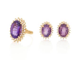1132 A Gold, Amethyst and Diamond Set Including a 14k gold ring centering an oval amethyst weighing approximately 9.20 carats, encircled by round diamond together with a pair of 18k gold earrings of similar design 3 pieces Ring: 9 1/2, Earrings: 3/4 x 1/2 in. 20.1 grams gross Estimate: $3,500 - $5,500