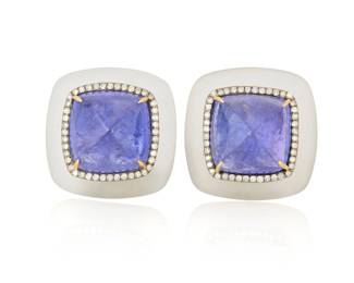 1137 A 14K Gold, Blackened Silver, Rock Crystal, Tanzanite and Diamond Pair of Earrings Centering two sugarloaf tanzanite's weigh 26.65 carats total encircled by round diamonds and carved rock crystal quartz 2 pieces Measures: 3/4 in. 14.4 grams gross Estimate: $1,000 - $1,500