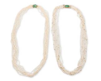 1067 A Group of Two 14K Gold, Freshwater Pearl and Jade Necklaces Featuring ten and eleven strands of freshwater pearls both finished with gold and carved jade clasps 2 pieces Length: 32 in. 195.2 grams gross Estimate: $700 - $900