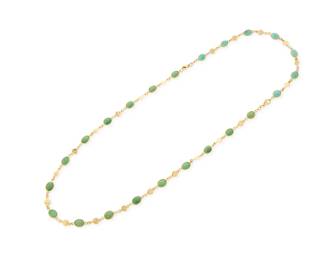 1125 A 14K Gold and Turquoise Necklace Of a stationed design featuring heart-shaped links and oval turquoise cabochons Length: 23 in. 17.7 grams gross Estimate: $700 - $1,000