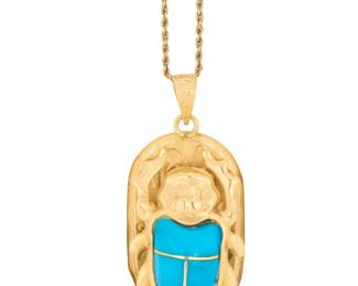 1124 A Gold and Turquoise Necklace Featuring a 14k gold rope chain suspending an 18k gold and turquoise scarab pendant Chain: 19 in., Pendant: 1 1/2 x 3/4 in. 8.2 grams gross Estimate: $800 - $1,200