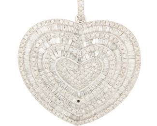 1044 A 14K White Gold and Diamond Pendant Of a heart-shaped design, featuring multiple rows of round and tapered baguette diamonds weighing approximately 5.75 carats Measures: 1 1/2 x 1 1/2 in. 14.4 grams gross Estimate: $1,500 - $2,000