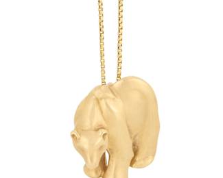 1148 A 14K Gold Pendant Necklace Featuring a 14k gold box chain suspending a satin polished bear pendant Chain: 23 in., Pendant: 1 x 3/4 in. 9.1 grams gross Estimate: $800 - $1,200
