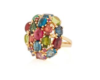 1028 A 14K Gold and Gem-Set Ring Featuring oval blue, green and pink tourmaline, garnet, amethyst, sapphire, peridot and amazonite all set in an oval domed design Size: 7 1/2 12.5 grams gross Estimate: $800 - $1,200