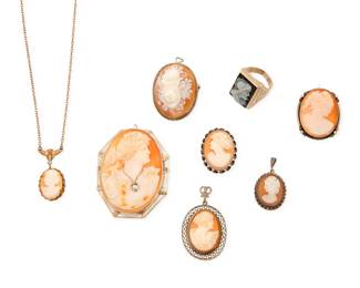 1203 A Group of Cameo Jewelry Including a 14k gold and cameo pendant/brooch set with a singular diamond, a 10k gold and agate cameo ring, three silver and cameo brooches and three silver and metal cameo pendants 8 pieces Ring: 9, Pendants/Brooches: 3/4 - 2 1/4 in. 57.7 grams gross This lot is being offered with no reserve Estimate: $200 - $400