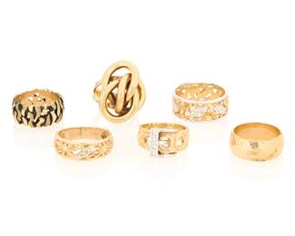 1121 A Group of Six 14K Gold Rings Featuring floral, buckle and organic designs 6 pieces Size: 6 1/2 - 10 1/2 46.0 grams gross Estimate: $2,800 - $3,500