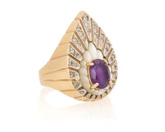 1128 Erte: A 14K Bi-Color Gold, Mother-Of-Pearl and Amethyst Ring Of a pear-shaped design featuring etched rays set with single-cut diamonds, an oval amethyst accented by a scalloped mother-of-pearl element, signed Erte, CFA Size: 6 1/2 10.9 grams gross This lot is being offered with no reserve Estimate: $500 - $700
