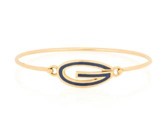 1159 A 9K Gold and Enamel Cuff Centering a 'G' design accented by navy blue enamel, with English hallmarks Inner circumference: 7 1/4 in. 8.7 grams gross This lot is being offered with no reserve Estimate: $400 - $600