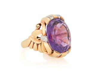 1131 A 14K Bi-Color Gold, Amethyst and Diamond Ring Centering an oval amethyst weighing approximately 17.10 carats, accented by single-cut diamonds set in a swirling ribbon design Size: 8 18.2 grams gross This lot is being offered with no reserve Estimate: $1,000 - $2,000