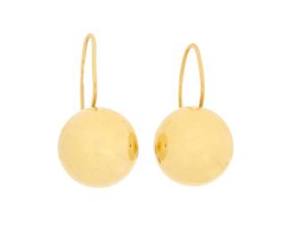 1039 A Pair of 14K Gold Earrings Of a hallow ball design 2 pieces Measures: 1/2 x 1/2 in. 3.9 grams gross This lot is being offered with no reserve Estimate: $300 - $500