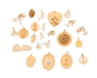 1033 A Group of Gold Charms Including a Dottie name plate, brides' maids, initials and a bowl charm 23 pieces Measures: 3/8 - 1 1/2 in. 62.0 grams gross Estimate: $4,000 - $6,000