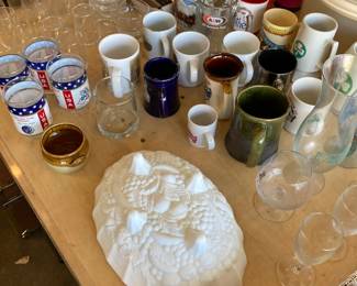 Assorted collectable mugs and containers