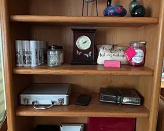 Oak Veneer Bookcase with Assorted Decorative and Personal Items