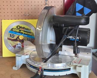 Lot # C38 - Delta ShopMaster Miter Saw with Oldham 10" 180 Tooth OSB-Plywood Steel Blade