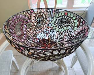 a large stained glass bowl