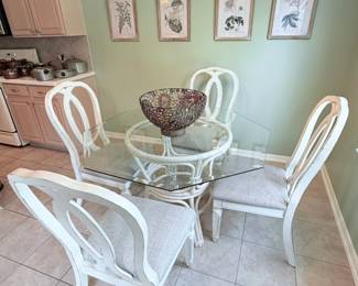 Vintage ratton table with glass top and 4 chairs