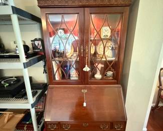 Fine mahogany secretary with hidden compartment by Jasper Cabinet